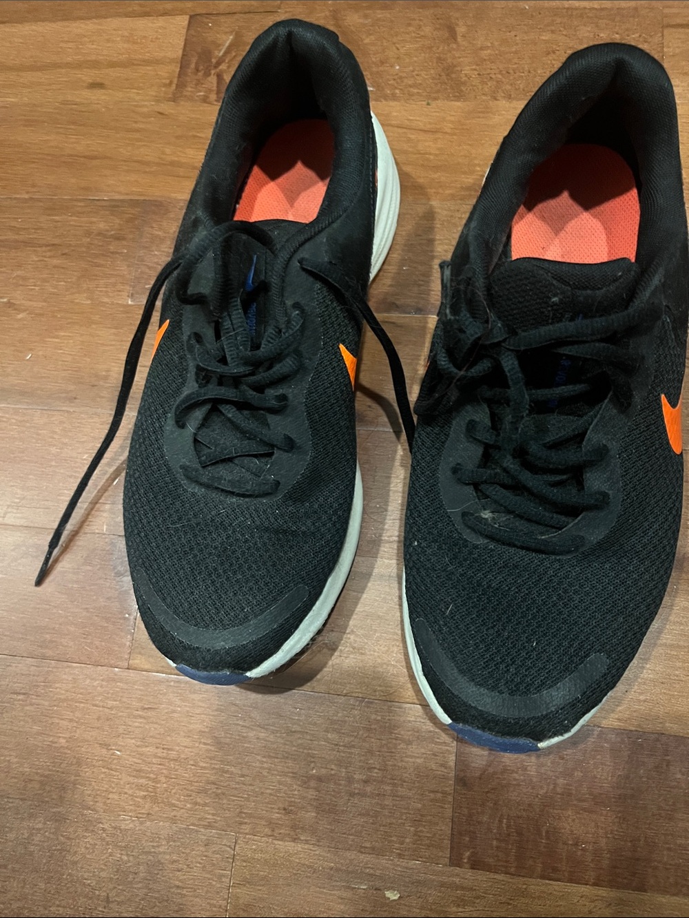 Nike Black Sneakers with Orange Accents
3 for 50 on bundles
